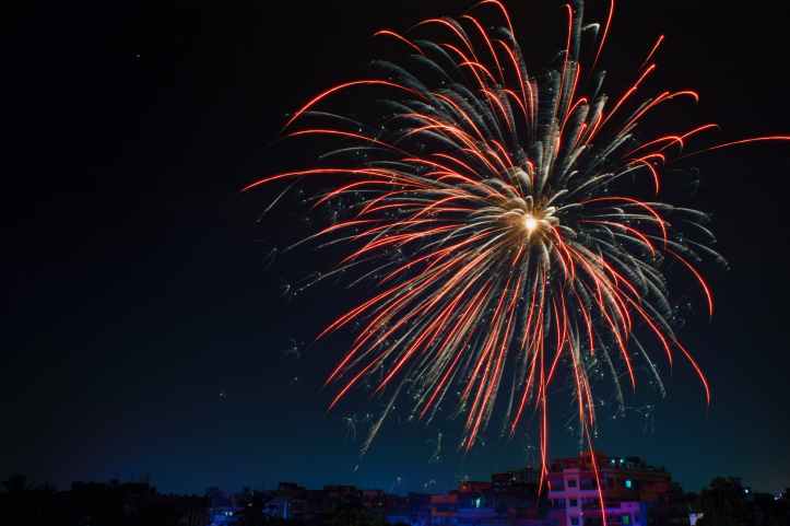 fireworks display over building